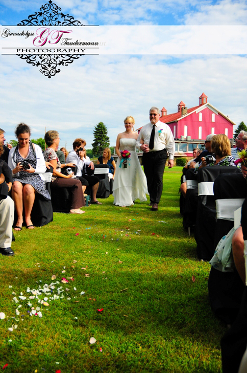 Wedding processional with the Mannitto Golf Clubhouse in the background